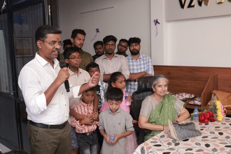 Founder addressing the V2W team and families