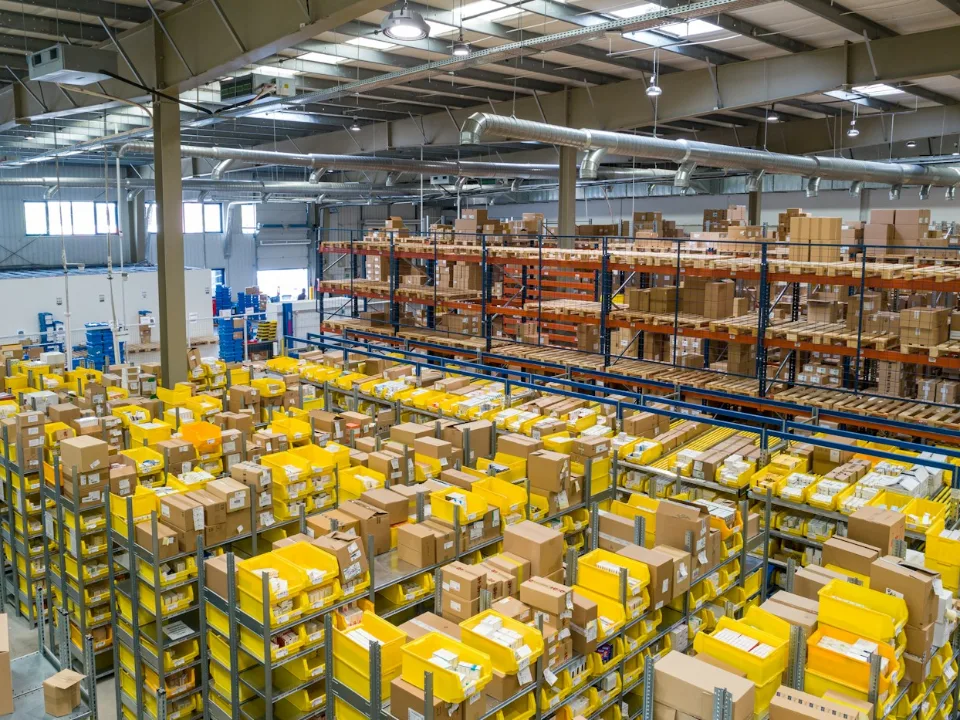 Large warehouse with organised shelves and stock